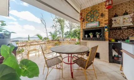 Casa em condomínio fechado com 3 quartos à venda na Rua Doutor Arnaldo da Silva Ferreira, --, Jardim Isabel, Porto Alegre por R$ 1.500.000