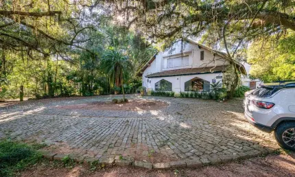 Casa com 4 quartos à venda na Avenida Coronel Marcos, 880, Pedra Redonda, Porto Alegre por R$ 2.400.000