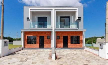 Casa em condomínio fechado com 3 quartos à venda na Estrada Jorge Pereira Nunes, 478, Campo Novo, Porto Alegre por R$ 629.000