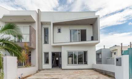 Casa em condomínio fechado com 3 quartos à venda na Rua Jorge Babot Miranda, --, Hípica, Porto Alegre por R$ 1.070.000