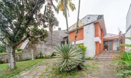 Casa com 4 quartos à venda na Rua Jacundá, --, Guarujá, Porto Alegre por R$ 750.000