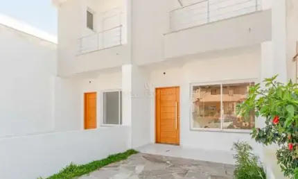 Casa com 2 quartos à venda na Rua Itacyr Rossi, --, Guarujá, Porto Alegre por R$ 500.000