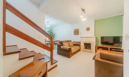 Casa em condomínio fechado com 3 quartos à venda na Avenida Eduardo Prado, 1954, Cavalhada, Porto Alegre por R$ 950.000