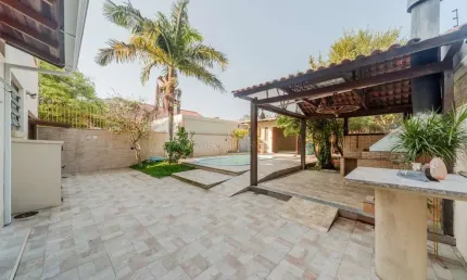 Casa com 3 quartos à venda na Avenida Guaíba, --, Serraria, Porto Alegre por R$ 1.370.000