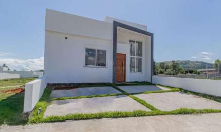 Casa com 3 quartos à venda na Rua Jean Vardaramatos, 360, Hípica, Porto Alegre por R$ 590.000
