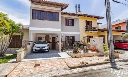 Casa em condomínio fechado com 3 quartos à venda na Rua Ponciano Pacheco da Silveira, --, Guarujá, Porto Alegre por R$ 510.000