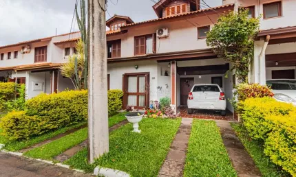 Casa em condomínio fechado com 3 quartos à venda na Avenida Eduardo Prado, --, Cavalhada, Porto Alegre por R$ 730.000