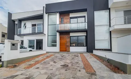 Casa em condomínio fechado com 3 quartos à venda na Rua Jorge Babot Miranda, 680, Hípica, Porto Alegre por R$ 930.000