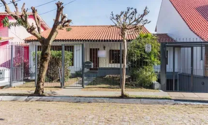 Casa com 4 quartos à venda na Rua Alcebíades Antônio dos Santos, --, Nonoai, Porto Alegre por R$ 980.000