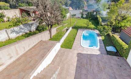 Casa com 3 quartos à venda na Rua Caeté, --, Vila Assunção, Porto Alegre por R$ 1.480.000
