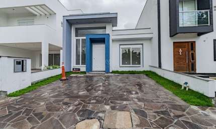 Casa em condomínio fechado com 3 quartos à venda na Rua Jorge Babot Miranda, 680, Hípica, Porto Alegre por R$ 610.000