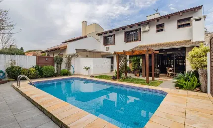 Casa com 4 quartos à venda na Rua Engenheiro Coelho Parreira, 384, Ipanema, Porto Alegre por R$ 1.272.000