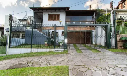 Casa com 3 quartos à venda na Rua Doutor Egydio Michaelsen, --, Cavalhada, Porto Alegre por R$ 980.000