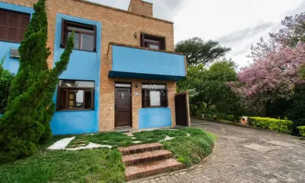 Casa em condomínio fechado com 2 quartos à venda na Avenida Vicente Monteggia, 2212, Cavalhada, Porto Alegre por R$ 450.000