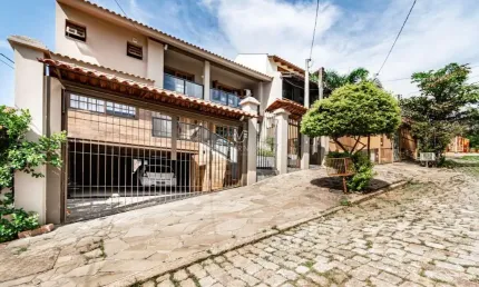 Casa com 3 quartos à venda na Rua Inês Vinhas, --, Espírito Santo, Porto Alegre por R$ 1.040.000