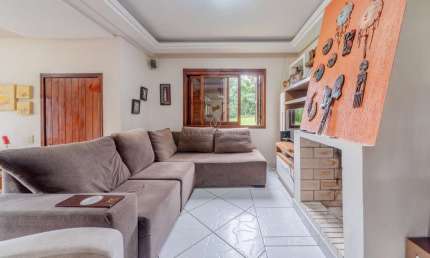 Casa em condomínio fechado com 4 quartos à venda na Avenida Vicente Monteggia, 2000, Cavalhada, Porto Alegre por R$ 880.000
