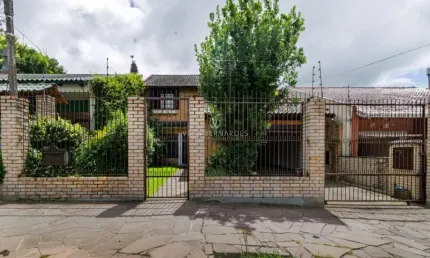 Casa com 3 quartos à venda na Rua Victor Silva, 136, Camaquã, Porto Alegre por R$ 1.000.000