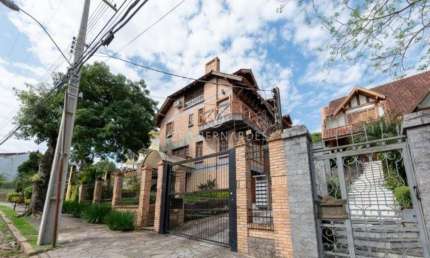 Casa em condomínio fechado com 3 quartos à venda na Rua Doutor Arnaldo da Silva Ferreira, --, Jardim Isabel, Porto Alegre por R$ 900.000