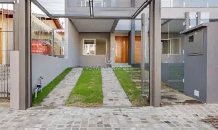 Casa com 3 quartos à venda na Rua Itacyr Rossi, --, Guarujá, Porto Alegre por R$ 560.000