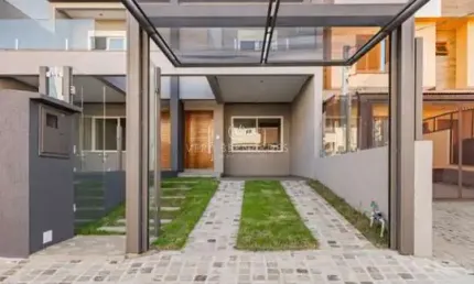 Casa com 3 quartos à venda na Rua Itacyr Rossi, --, Guarujá, Porto Alegre por R$ 560.000