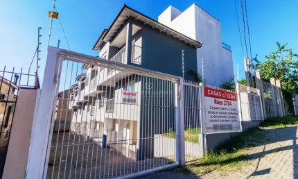 Casa em condomínio fechado com 2 quartos à venda na Rua Padre João Batista Reus, 2754, Camaquã, Porto Alegre por R$ 480.000