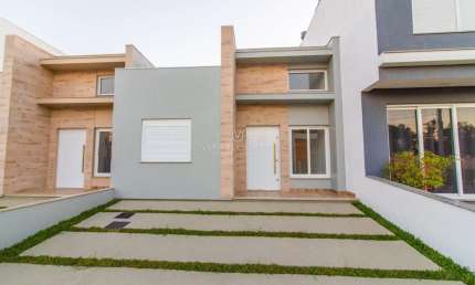 Casa em condomínio fechado com 2 quartos à venda na Rua Jean Vardaramatos, 130, Hípica, Porto Alegre por R$ 495.000