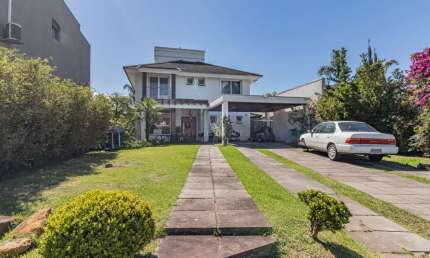 Casa em condomínio fechado com 3 quartos à venda na Avenida Juca Batista, --, Belém Novo, Porto Alegre por R$ 2.150.000