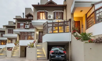 Casa em condomínio fechado com 3 quartos à venda na Rua Padre João Batista Reus, 438, Vila Conceição, Porto Alegre por R$ 1.350.000