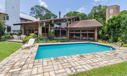 Casa em condomínio fechado com 4 quartos à venda na Avenida da Cavalhada, 5205, Cavalhada, Porto Alegre por R$ 3.500.000