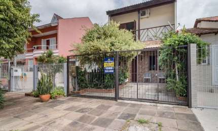 Casa com 3 quartos à venda na Rua Vacaria, --, Hípica, Porto Alegre por R$ 520.000