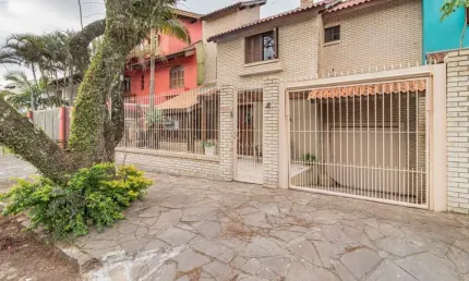 Casa com 3 quartos à venda na Rua Homero Só Jobim, --, Ipanema, Porto Alegre por R$ 1.050.000