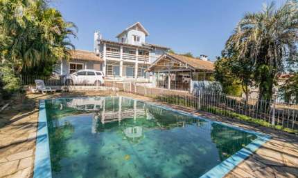 Casa com 6 quartos à venda na Rua Marquês do Maricá, --, Vila Nova, Porto Alegre por R$ 1.300.000