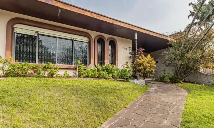 Casa com 4 quartos à venda na Rua Jacipuia, --, Guarujá, Porto Alegre por R$ 1.450.000