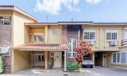 Casa em condomínio fechado com 3 quartos à venda na Rua Doutor Armando Barbedo, 832, Tristeza, Porto Alegre por R$ 795.000