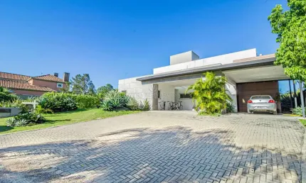 Casa em condomínio fechado com 3 quartos à venda na Avenida Juca Batista, 8000, Belém Novo, Porto Alegre por R$ 2.950.000