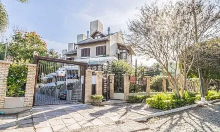 Casa em condomínio fechado com 4 quartos à venda na Rua Padre João Batista Reus, 438, Tristeza, Porto Alegre por R$ 1.490.000