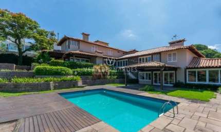 Casa em condomínio fechado com 5 quartos à venda na Avenida da Cavalhada, 5205, Cavalhada, Porto Alegre por R$ 4.800.000