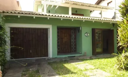 Casa com 3 quartos à venda na Rua Doutor Benjamin Camozato, --, Jardim Isabel, Porto Alegre por R$ 1.300.000
