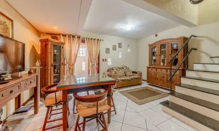 Casa em condomínio fechado com 3 quartos à venda na Avenida Wenceslau Escobar, --, Tristeza, Porto Alegre por R$ 520.000