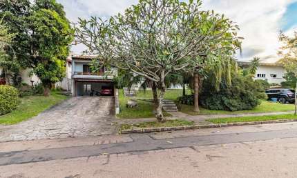 Casa em condomínio fechado com 4 quartos à venda na Avenida Firmino Octávio Bimbi, --, Cavalhada, Porto Alegre por R$ 1.290.000