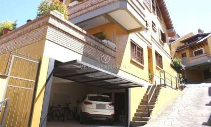 Casa em condomínio fechado com 3 quartos à venda na Rua Edgar Luiz Schneider, 54, Jardim Isabel, Porto Alegre por R$ 950.000
