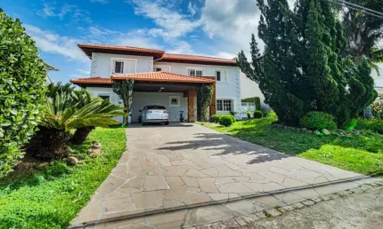 Casa em condomínio fechado com 3 quartos à venda na Avenida Juca Batista, --, Belém Novo, Porto Alegre por R$ 2.980.000