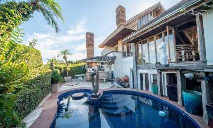 Casa com 4 quartos à venda na Rua Edgar Luiz Schneider, 15, Jardim Isabel, Porto Alegre por R$ 1.500.000