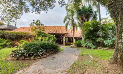 Casa em condomínio fechado com 4 quartos à venda na Avenida da Cavalhada, 5205, Cavalhada, Porto Alegre por R$ 2.500.000