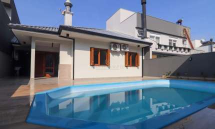 Casa em condomínio fechado com 3 quartos à venda na Rua Francisco Solano Borges, --, Hípica, Porto Alegre por R$ 899.000