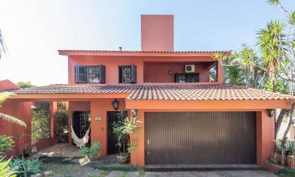 Casa com 4 quartos à venda na Rua General Tadeusz Kosciuszko, 160, Jardim Isabel, Porto Alegre por R$ 1.500.000