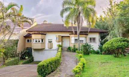 Casa com 4 quartos à venda na Rua Doutor Arnaldo da Silva Ferreira, --, Jardim Isabel, Porto Alegre por R$ 1.530.000