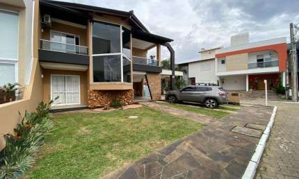 Casa em condomínio fechado com 3 quartos à venda na Rua Eroni Soares Machado, --, Hípica, Porto Alegre por R$ 900.000