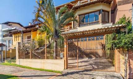Casa com 3 quartos à venda na Rua Imeram Teixeira Cabeleira, 0149, Ipanema, Porto Alegre por R$ 995.000