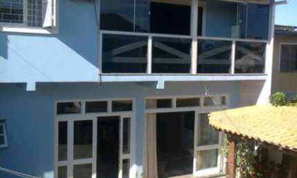 Casa com 3 quartos à venda na Rua Arapei, --, Cristal, Porto Alegre por R$ 1.200.000